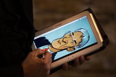 caricaturiste sur tablette ipad